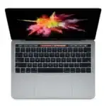 Clavier de MacBook Pro avec écran brillant affichant explosion de couleurs vibrantales, image haute qualité, pour vente déstockage d'informatique, matériel high-tech, Apple, ordinateur portable, promotion.