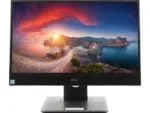 Dell moniteur d'ordinateur avec écran large affichant un paysage côtier au coucher du soleil, idéal pour le bureau ou le gaming, haute résolution pour une expérience visuelle immersive.