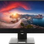 Dell moniteur d'ordinateur avec écran large affichant un paysage côtier au coucher du soleil, idéal pour le bureau ou le gaming, haute résolution pour une expérience visuelle immersive.
