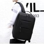 Sac à dos anthracite imperméable pour ordinateur portable avec port de charge USB porté à l'épaule - DestockAfric