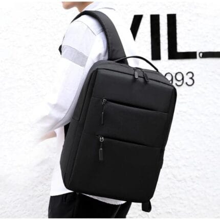 Sac à dos anthracite imperméable pour ordinateur portable avec port de charge USB porté à l'épaule - DestockAfric